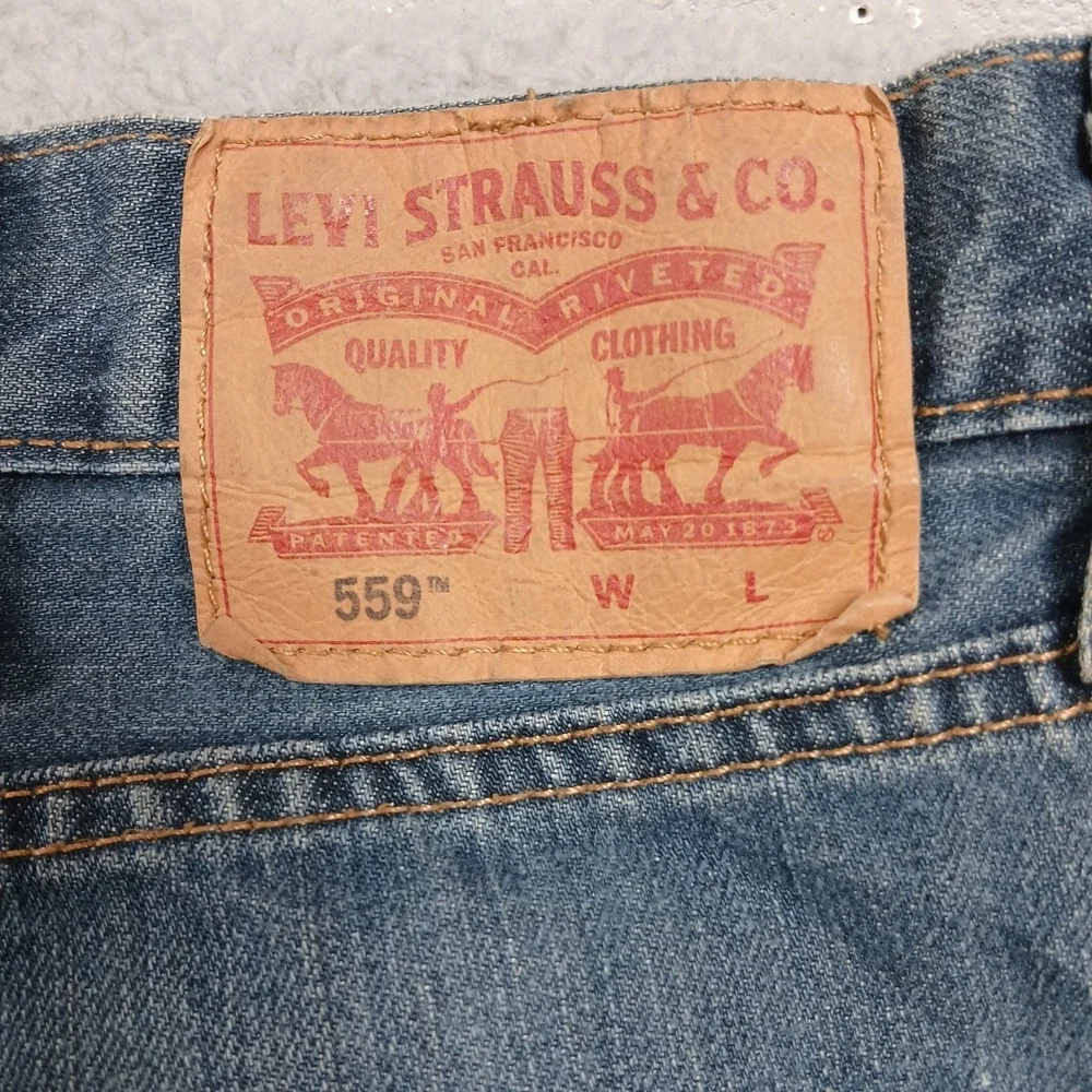 Levi's 559 Relaxed‎ Straight Jeans Mens 50x32 Medium Wash Blue Denim EUC